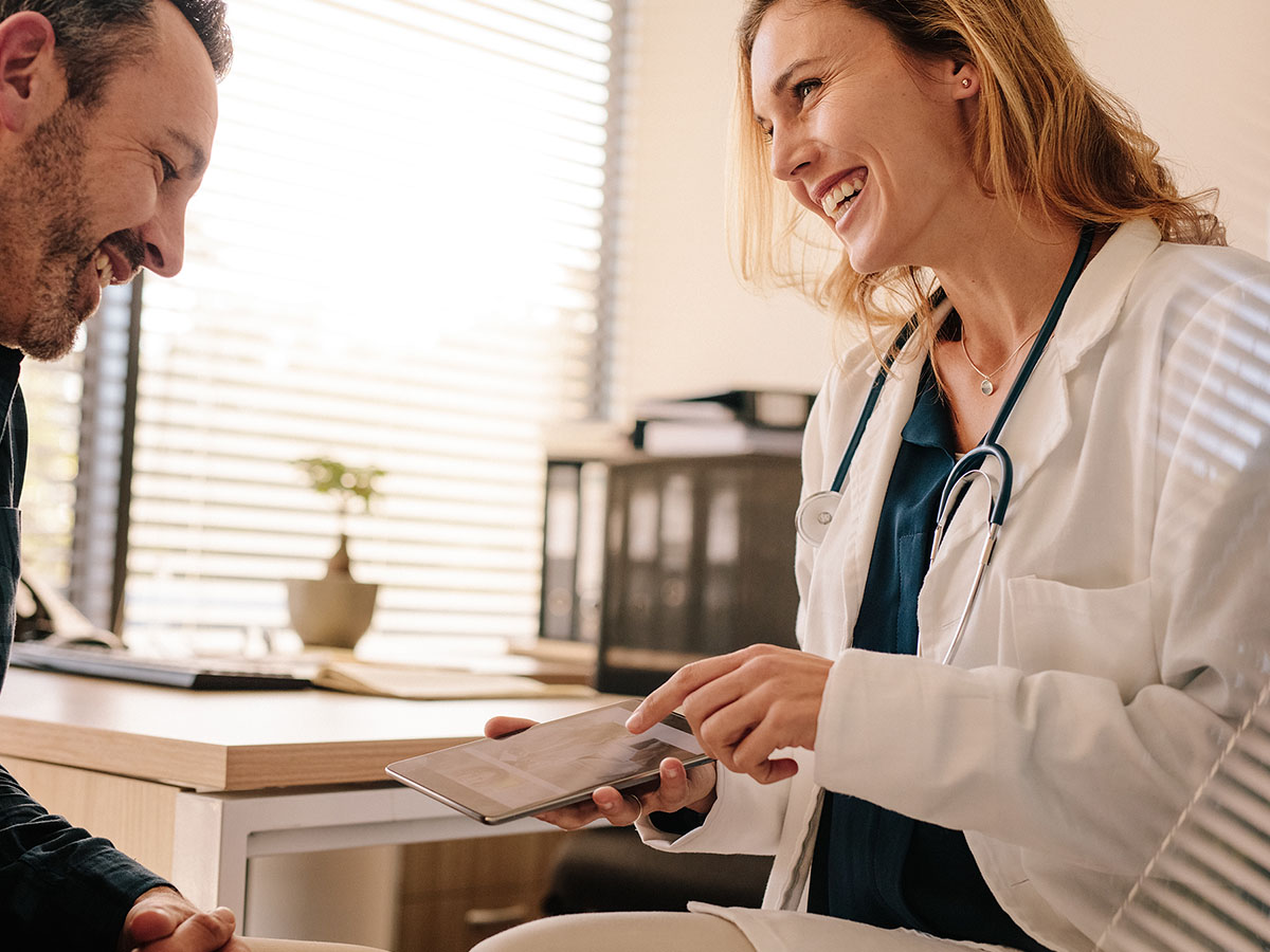 Doctor speaking with her patient