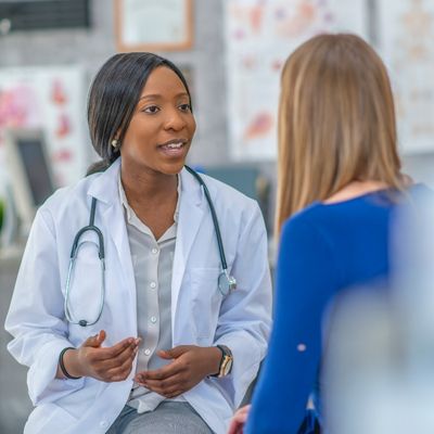 doctor speaking with patient