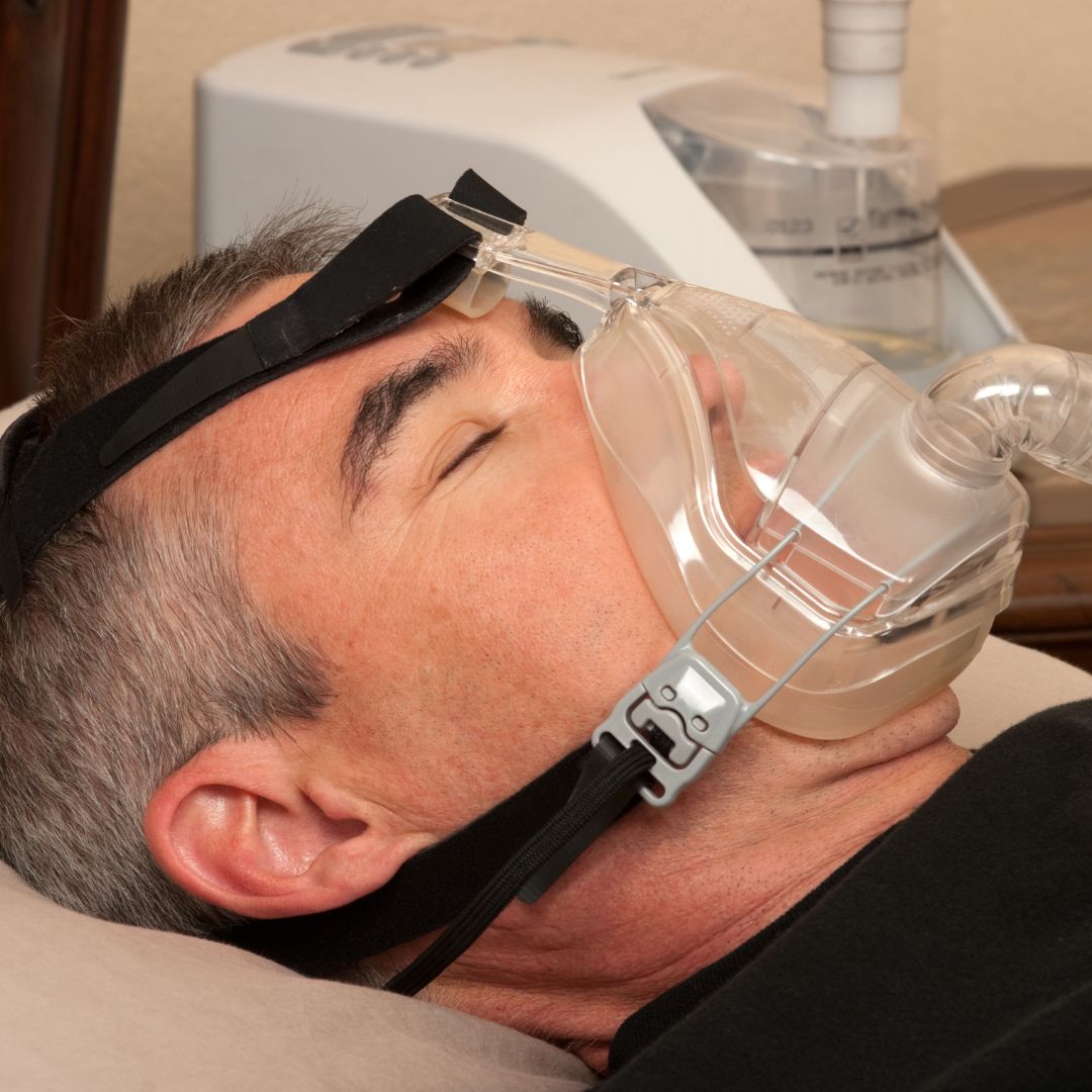 man sleeping with bipap