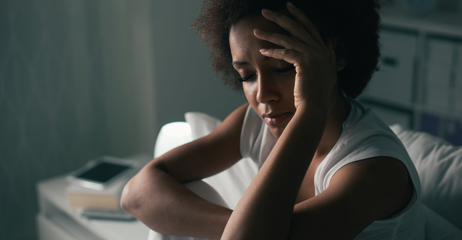 Woman up late having trouble sleeping