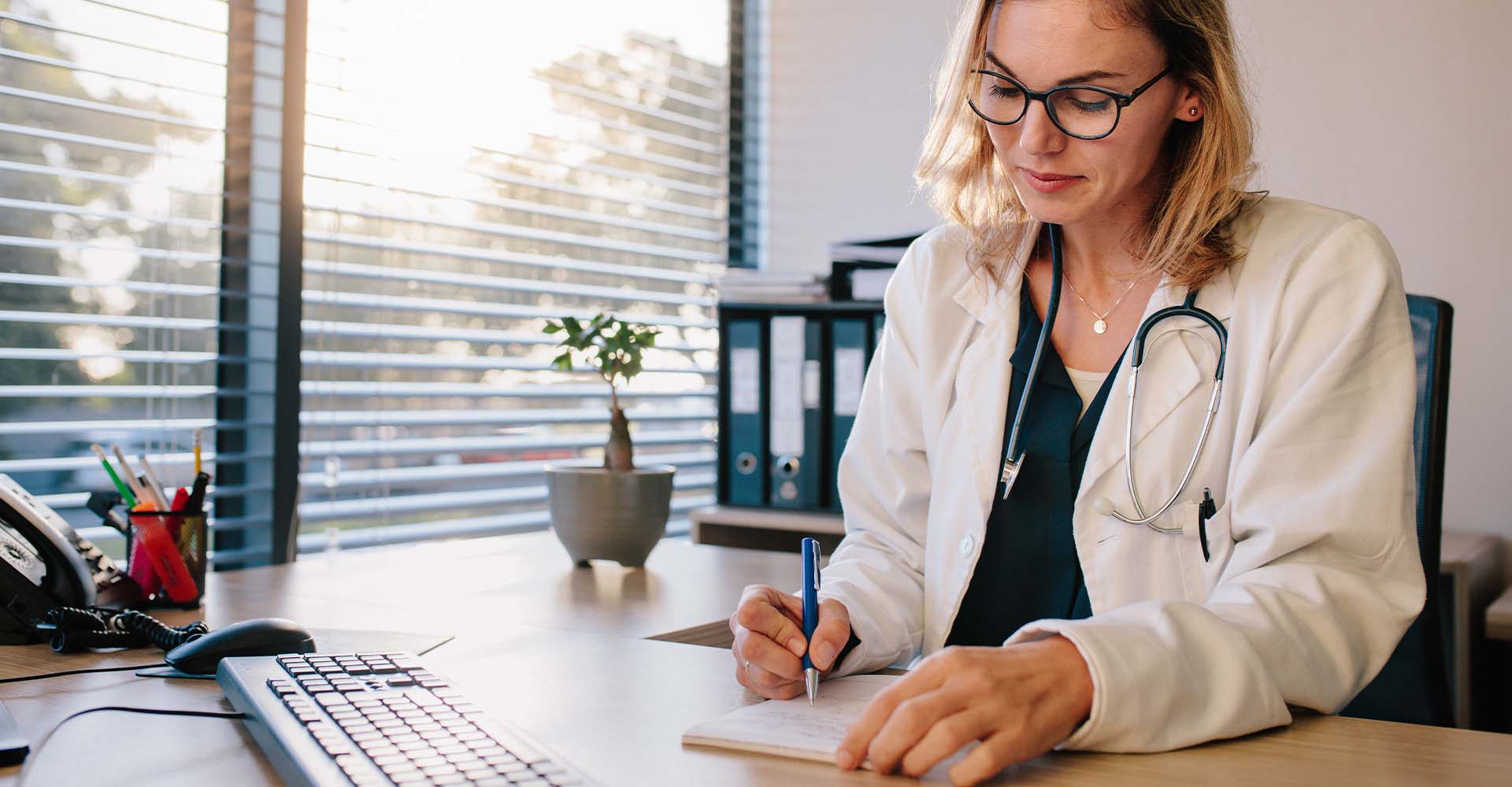 female doctor at her desk